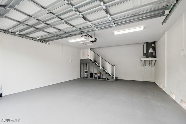 8605 Inwood Dr, Hudson, FL 34667 - garage featuring water heater