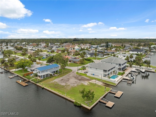 8605 Inwood Dr, Hudson, FL 34667 - aerial perspective of suburban area featuring a large body of water