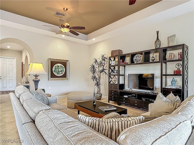 10843 Valentina Ct, Fort Myers, FL 33913 - living room with arched walkways, ceiling fan, baseboards, and recessed lighting