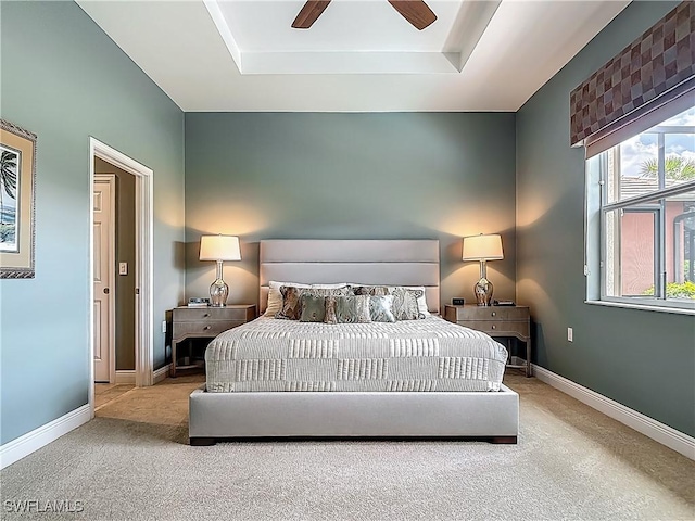 10843 Valentina Ct, Fort Myers, FL 33913 - carpeted bedroom with a raised ceiling, baseboards, and a ceiling fan