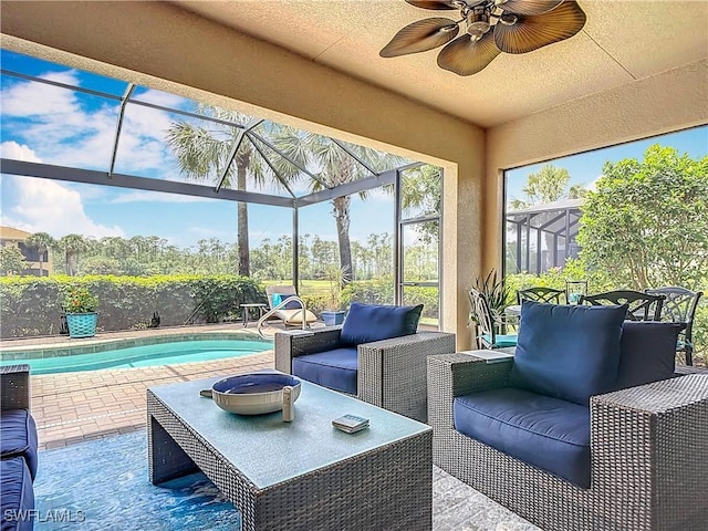 10843 Valentina Ct, Fort Myers, FL 33913 - sunroom / solarium with a swimming pool, outdoor lounge area, and a ceiling fan