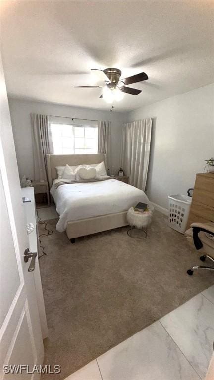 1005 E Penn Rd, Lehigh Acres, FL 33936 - bedroom featuring a ceiling fan and carpet