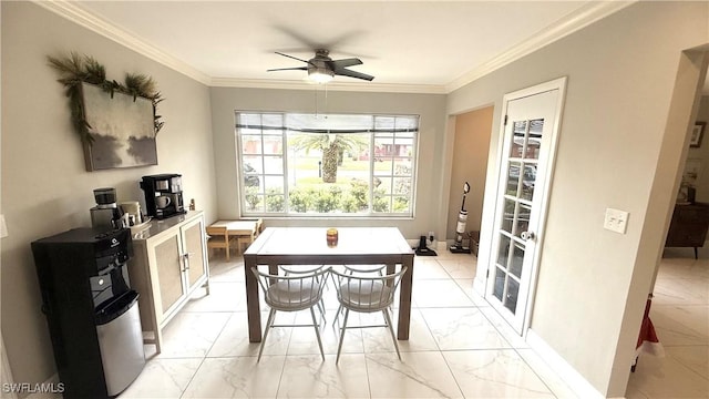 1005 E Penn Rd, Lehigh Acres, FL 33936 - dining room featuring crown molding, marble finish floor, ceiling fan, and baseboards