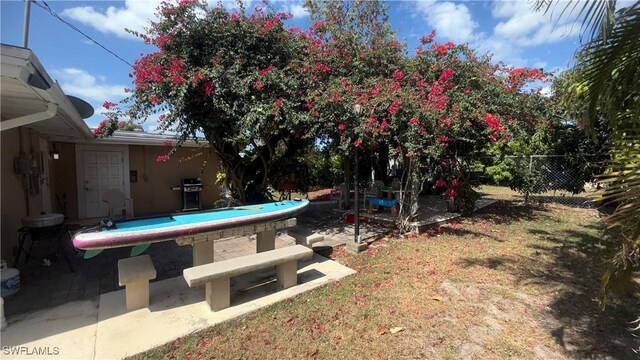 1005 E Penn Rd, Lehigh Acres, FL 33936 - view of yard featuring fence