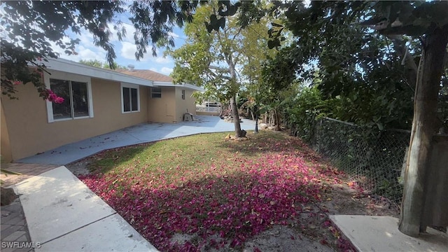 1005 E Penn Rd, Lehigh Acres, FL 33936 - view of yard with a patio and fence