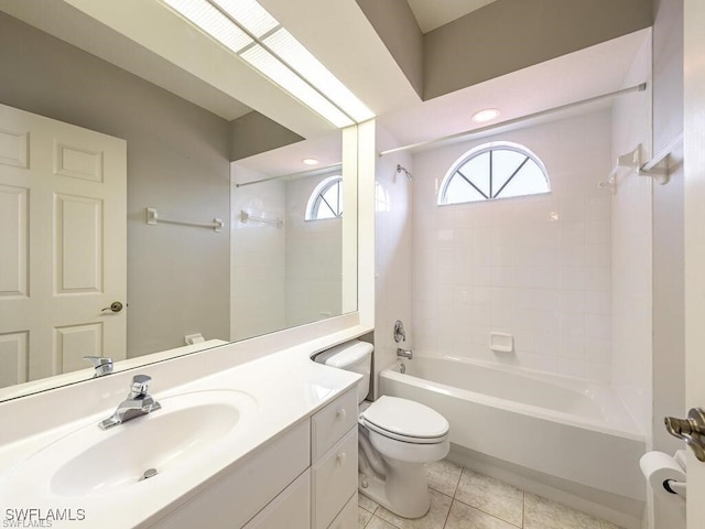 full bath featuring toilet, shower / washtub combination, tile patterned flooring, and vanity