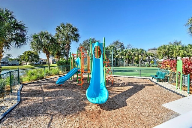 community play area featuring fence