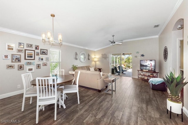 dining space with plenty of natural light, ornamental molding, and wood finished floors