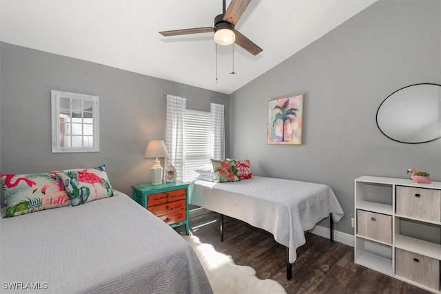 bedroom with baseboards, lofted ceiling, wood finished floors, and ceiling fan