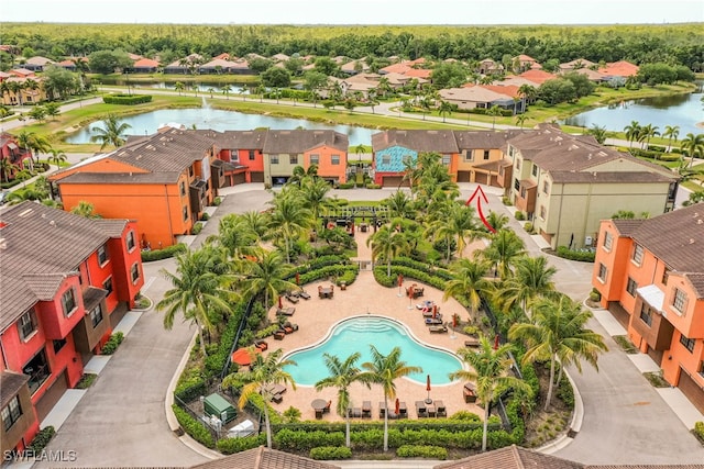 aerial view with a residential view and a water view