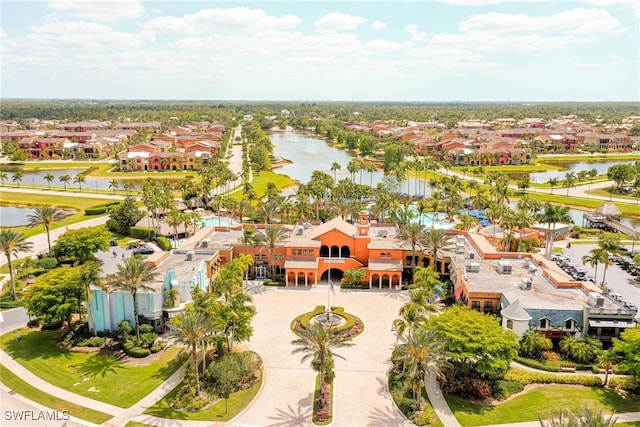 bird's eye view with a residential view and a water view