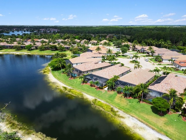aerial view featuring a water view and a residential view