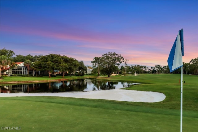 13488 Rosewood Ln, Naples, FL 34119 - view of home's community with a water view, golf course view, and a yard