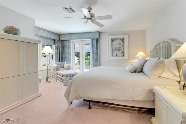 13488 Rosewood Ln, Naples, FL 34119 - carpeted bedroom featuring access to exterior and ceiling fan