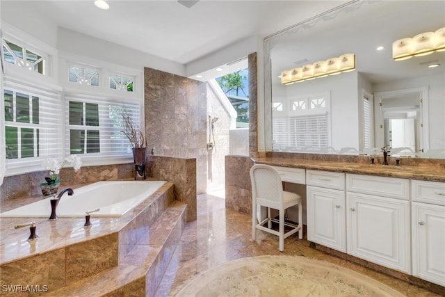 13488 Rosewood Ln, Naples, FL 34119 - full bathroom with a garden tub, vanity, walk in shower, recessed lighting, and marble tiled flooring