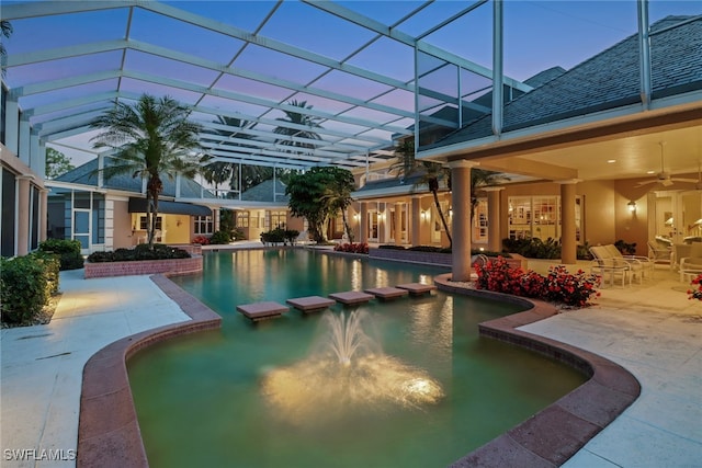 13488 Rosewood Ln, Naples, FL 34119 - view of pool featuring a patio, a ceiling fan, a pool with connected hot tub, and glass enclosure