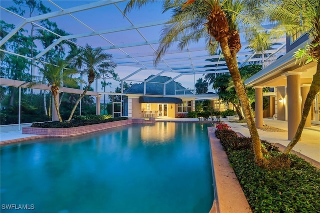 13488 Rosewood Ln, Naples, FL 34119 - swimming pool featuring a patio and a lanai