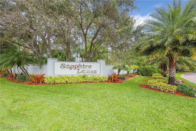community sign with a lawn