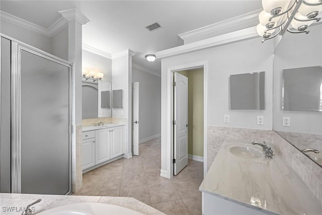 full bath with crown molding, tile patterned flooring, a shower stall, a chandelier, and two vanities