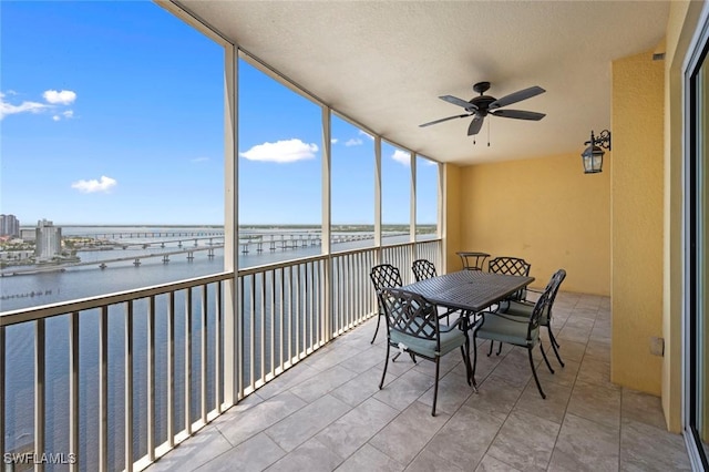sunroom with a water view