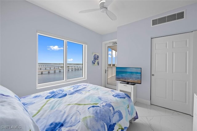 bedroom featuring baseboards, marble finish floor, ceiling fan, and visible vents