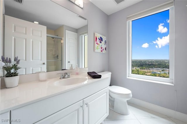 full bath featuring toilet, a stall shower, visible vents, baseboards, and vanity