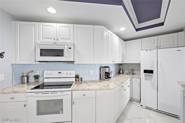 kitchen with white cabinetry, white appliances, and recessed lighting