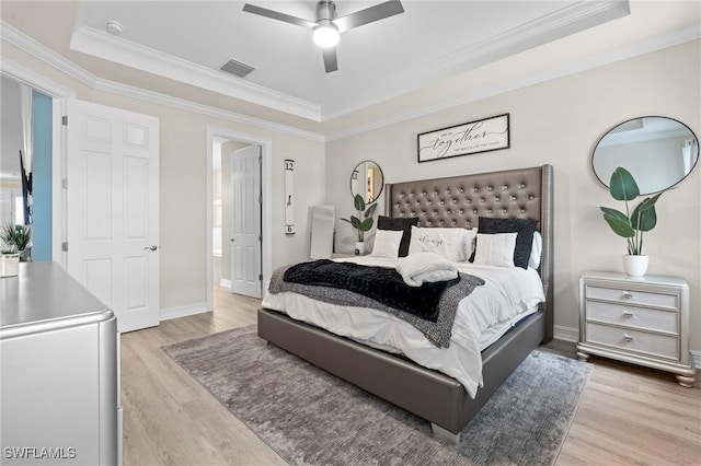 28140 Captiva Shell Loop, Bonita Springs, FL 34135 - bedroom with a raised ceiling, light wood-style floors, and visible vents