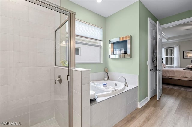 28140 Captiva Shell Loop, Bonita Springs, FL 34135 - full bath with wood finished floors, a bath, ensuite bathroom, baseboards, and a shower stall