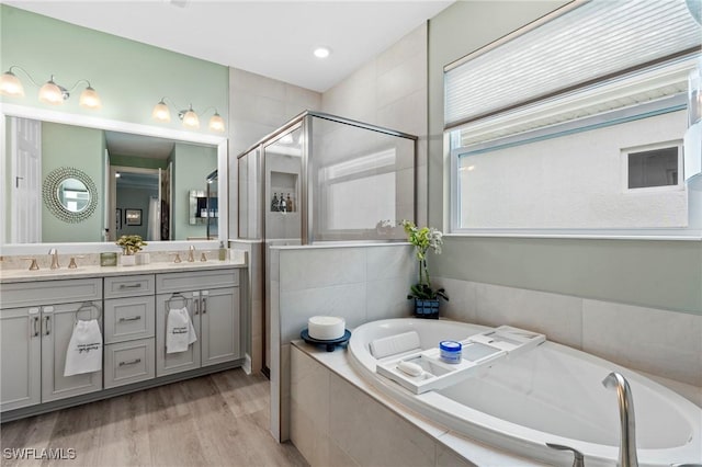 28140 Captiva Shell Loop, Bonita Springs, FL 34135 - bathroom with a bath, a stall shower, and a sink