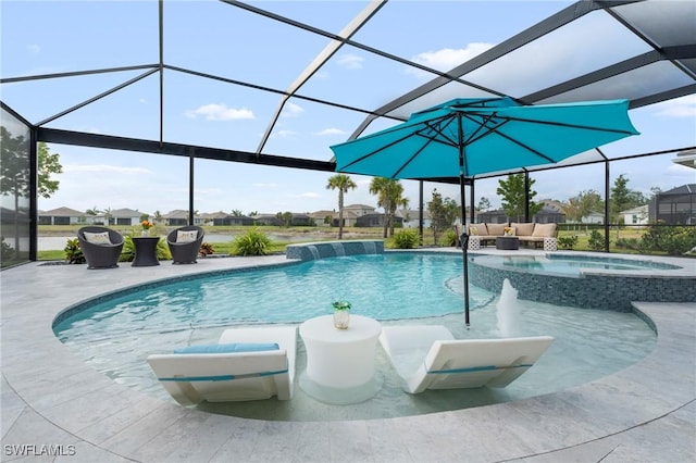 28140 Captiva Shell Loop, Bonita Springs, FL 34135 - view of swimming pool with an outdoor hangout area, a patio area, a pool with connected hot tub, and glass enclosure