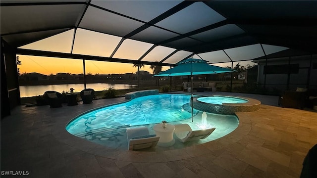 28140 Captiva Shell Loop, Bonita Springs, FL 34135 - view of swimming pool featuring a water view, a patio area, a pool with connected hot tub, and glass enclosure