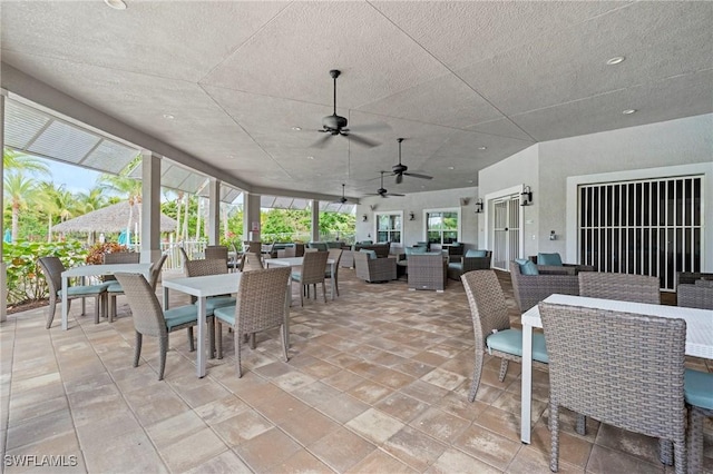 28140 Captiva Shell Loop, Bonita Springs, FL 34135 - view of patio / terrace with outdoor lounge area, outdoor dining area, and a ceiling fan