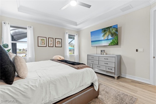 28140 Captiva Shell Loop, Bonita Springs, FL 34135 - bedroom with ornamental molding, ceiling fan, visible vents, wood finished floors, and a raised ceiling