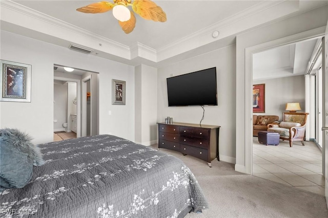 bedroom featuring carpet, baseboards, ornamental molding, visible vents, and tile patterned flooring