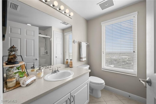 bathroom featuring baseboards, tile patterned flooring, visible vents, and a shower stall