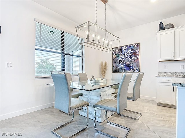 13868 Pine Lodge Ln, Fort Myers, FL 33913 - dining area featuring a chandelier and baseboards