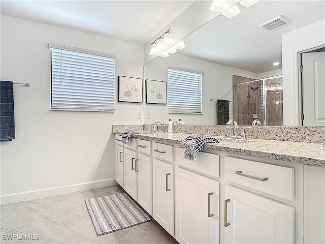 13868 Pine Lodge Ln, Fort Myers, FL 33913 - full bath with a shower stall, double vanity, and baseboards