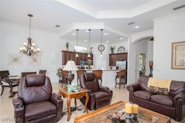 living room with arched walkways, crown molding, a chandelier, and visible vents