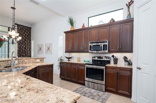 kitchen featuring a sink, stainless steel appliances, backsplash, and visible vents