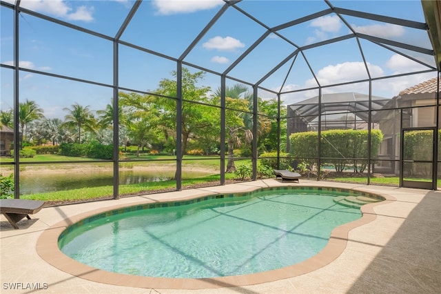 pool with a patio and a lanai