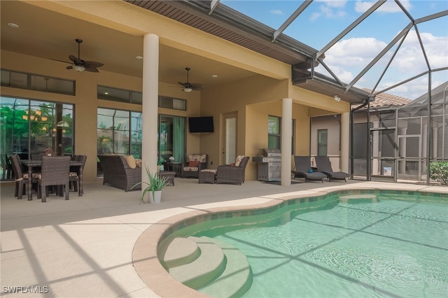 pool featuring a patio area, area for grilling, a lanai, an outdoor living space, and ceiling fan