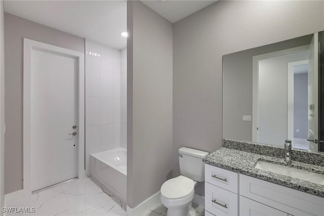 full bathroom with vanity, toilet, marble finish floor, baseboards, and tub / shower combination