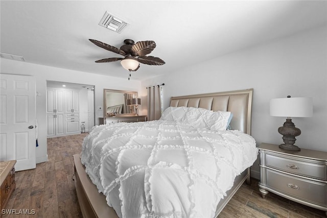 2080 39th St SW, Naples, FL 34117 - bedroom with wood finished floors, a ceiling fan, and a closet