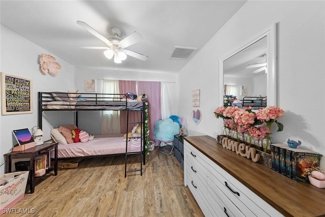 2080 39th St SW, Naples, FL 34117 - bedroom with light wood-style floors and a ceiling fan