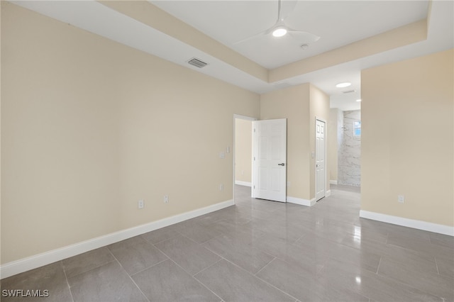 1043 Albert Ave, Lehigh Acres, FL 33971 - empty room featuring baseboards, ceiling fan, visible vents, and tile patterned floors