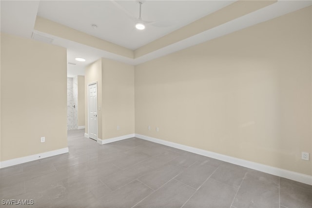 1043 Albert Ave, Lehigh Acres, FL 33971 - unfurnished room with tile patterned floors, baseboards, and a ceiling fan