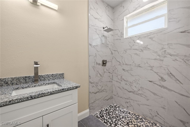 1043 Albert Ave, Lehigh Acres, FL 33971 - bathroom featuring vanity and a marble finish shower