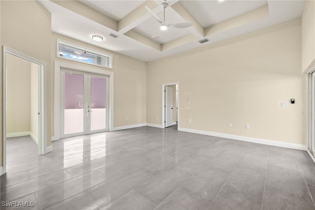 1043 Albert Ave, Lehigh Acres, FL 33971 - spare room with french doors, ceiling fan, coffered ceiling, and visible vents