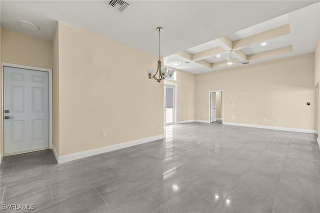 1043 Albert Ave, Lehigh Acres, FL 33971 - spare room with a chandelier, baseboards, visible vents, and coffered ceiling
